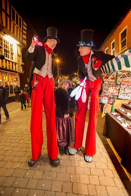 victorian themed stilt walkers