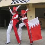 F1 themed stilt walkers