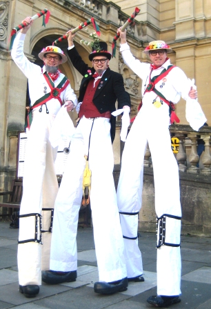 morris men entertainers on stilts