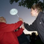 teaching plate spinning at circus workshop