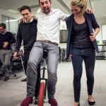 learn to unicycle at circus team building event.