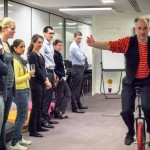 unicycle demonstration at team building event.