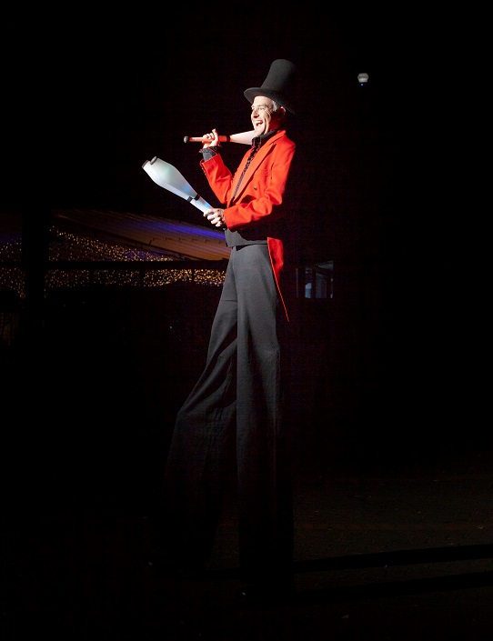 greatest showman stilt walker