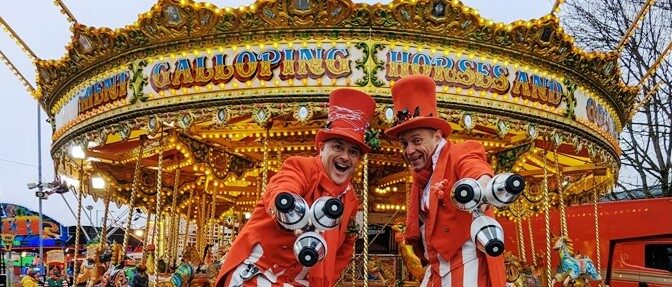christmas stilt walkers