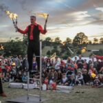 fire show with walking ladder finale