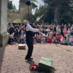 comedy juggling show, chin balance trick