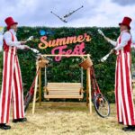 stilt walkers performing at corporate event