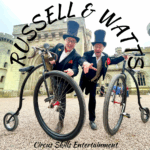 Circus skills entertainers with penny farthings